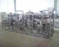 دستگاه فرم فیل سیل بسته بندی تک نفره عسل کره اب معدنی.